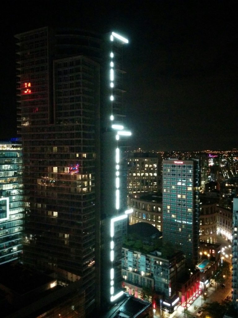 Bright lights on Telus Gardens