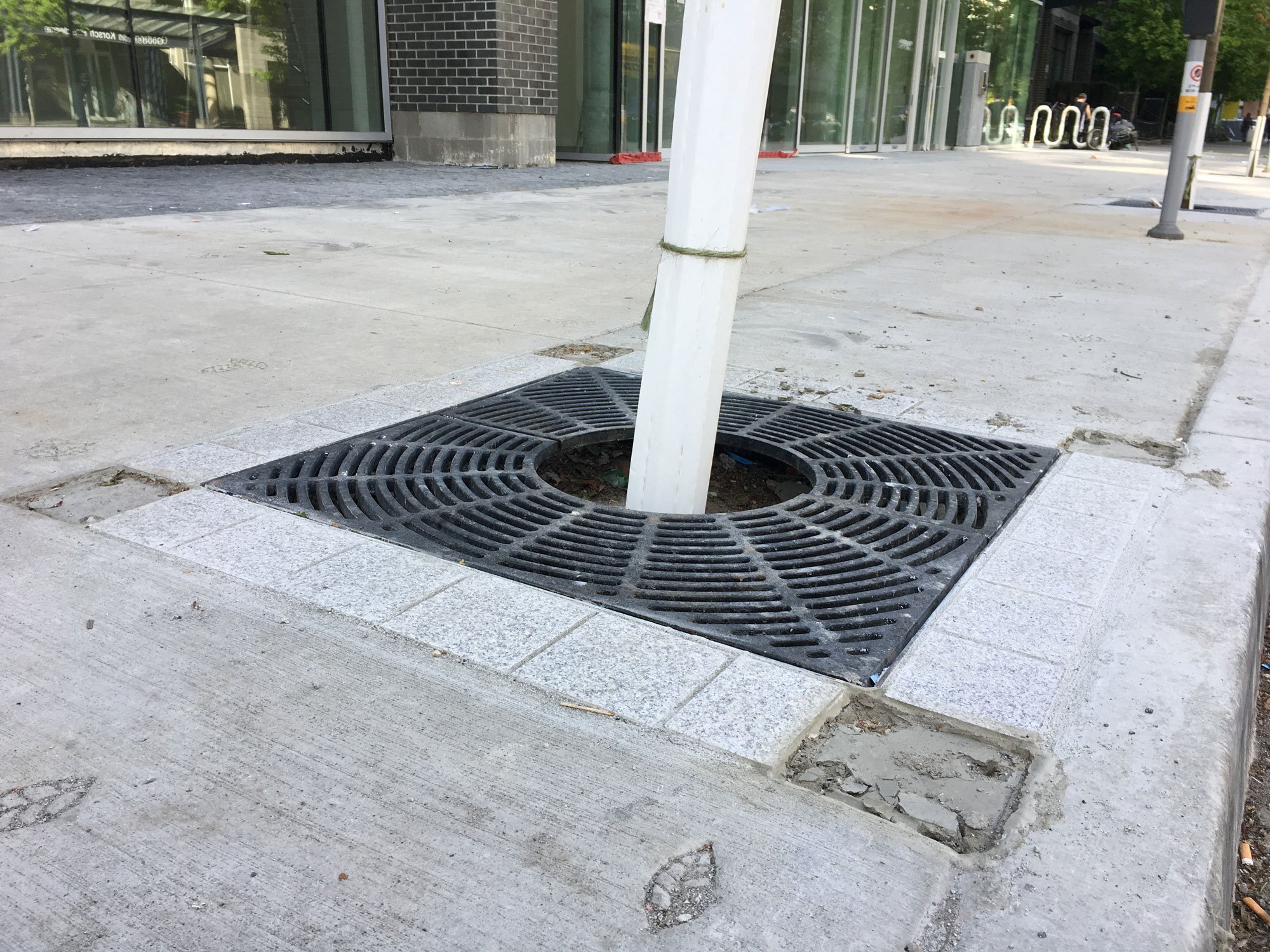 https://www.urbanyvr.com/wp-content/uploads/2019/05/Missing-brass-medallions-in-front-of-Tate.jpg