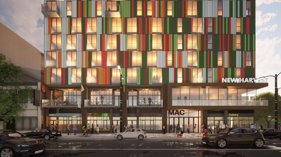 Main and Cordova development, rendering of Main Street frontage in evening.