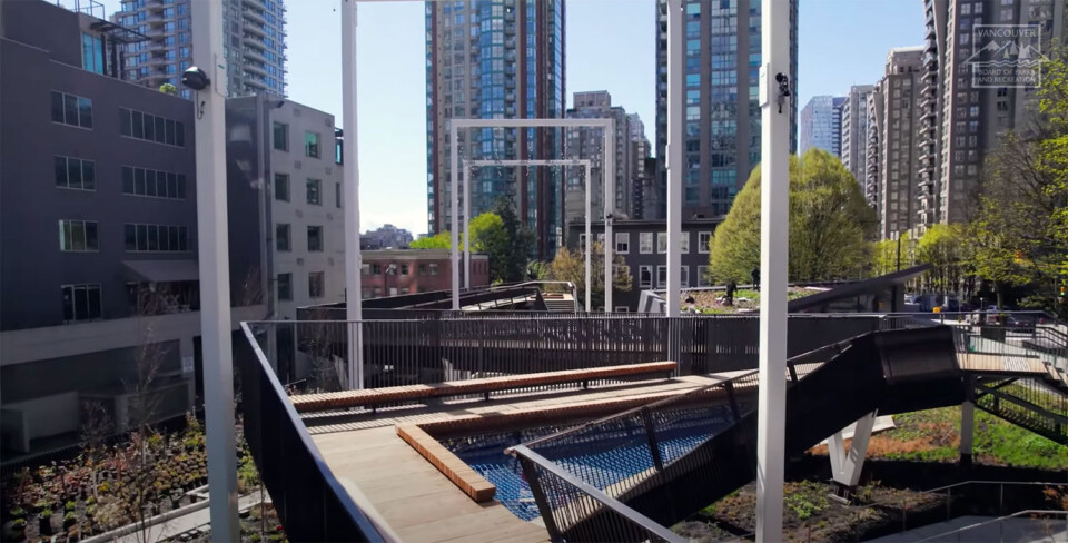 Drone footage of the elevated walkway, looking southwest
